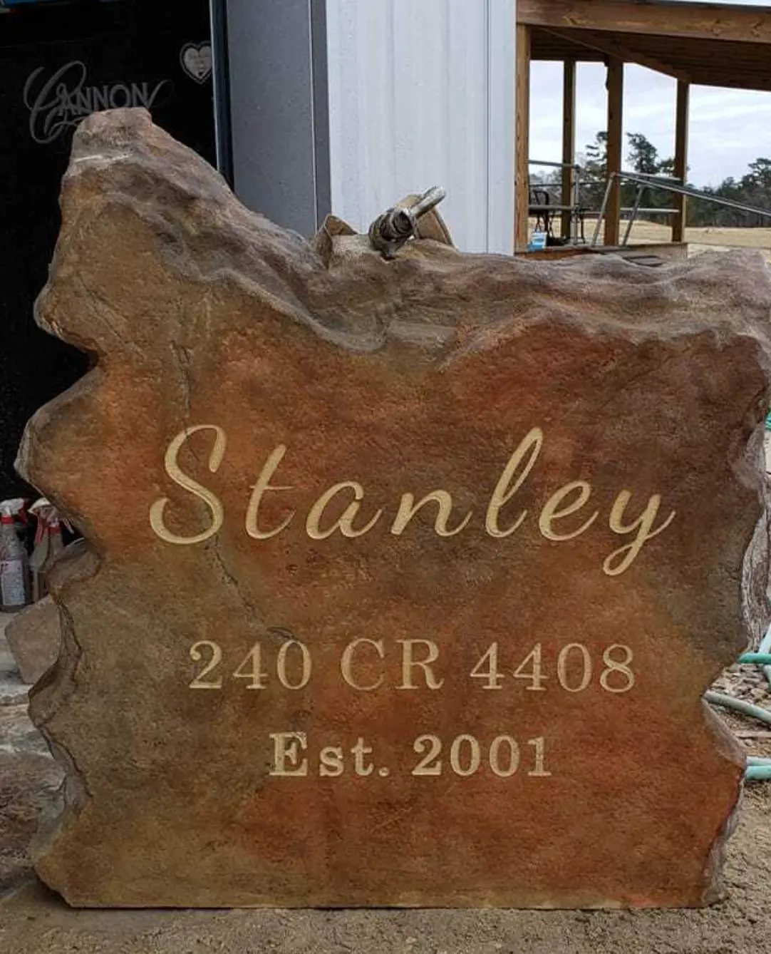 Stanley address monument stone engraved in gold script