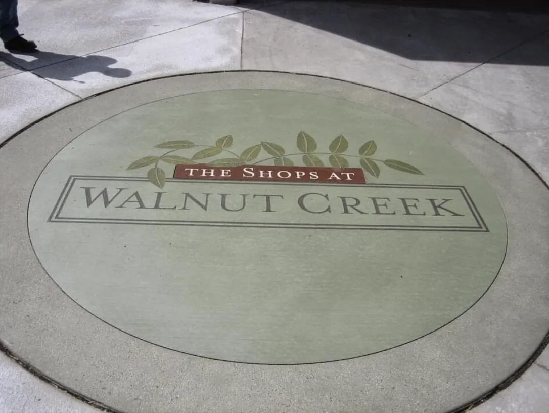 The Shops at Walnut Creek medallion engraved in concrete