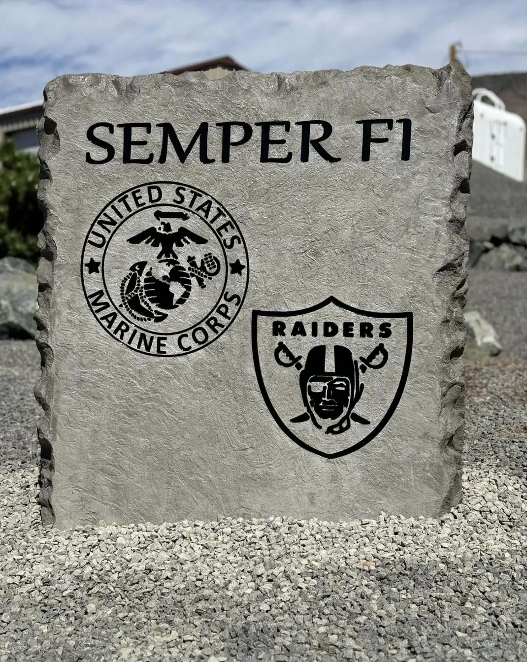 Semper Fi Marine Corps emblem engraved into a yard stone